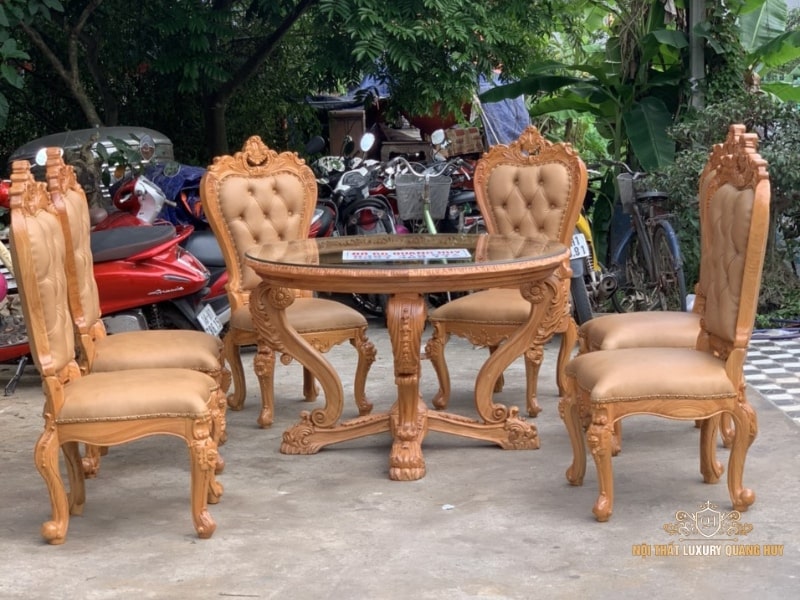 Bàn ăn thiết kế mặt tròn với 4 ghế đệm da cao cấp